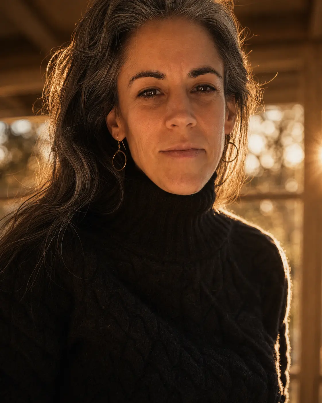 Portrait of Marla Moffet in warm golden backlight